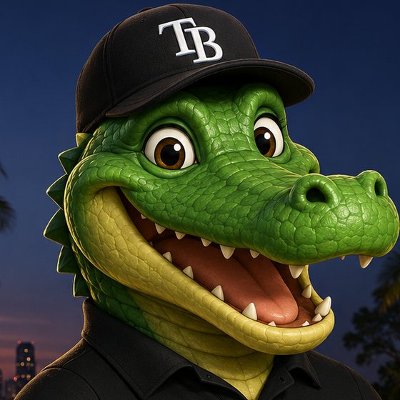 Chomp, the Bayshore Nightscapes alligator, in a Tampa Bay ball cap